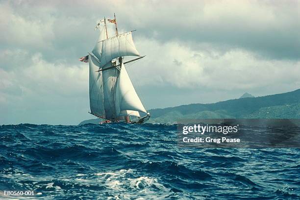 sailboat in rough seas, st. lucia, carribean - pirate ship fotografías e imágenes de stock