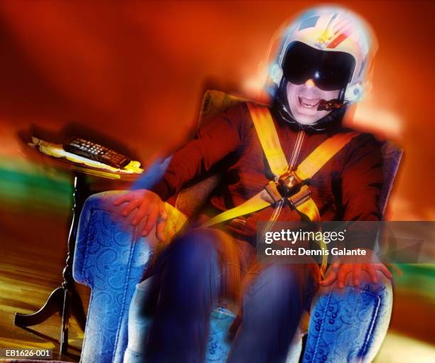 pilot in helmet and flight suit sitting in chair(digital composite) - flight suit stock pictures, royalty-free photos & images