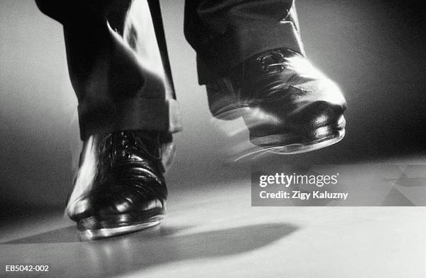 tap dancing, close-up of feet (b&w) - tap dancing stock pictures, royalty-free photos & images