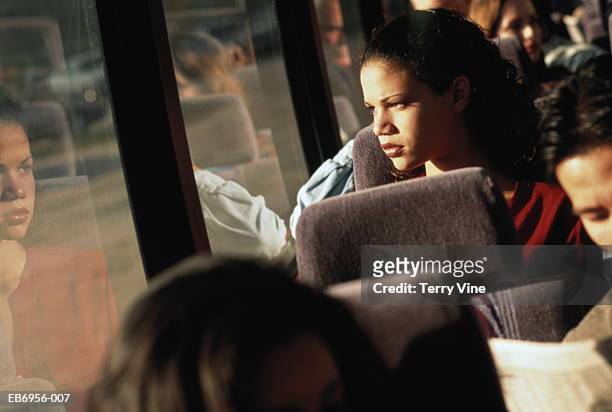 young woman on bus - bus side view stock pictures, royalty-free photos & images