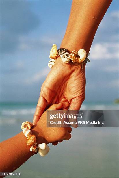Shell Using Hand Lesn 3,913 Hand Holding Shell Stock Photos, High-Res Pictures, and Images ...