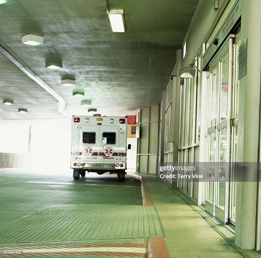 Ambulance in front of hospital entry way