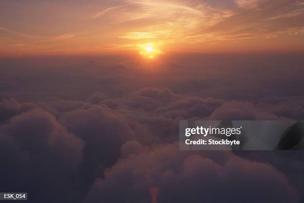 aerial view of cloudbank at sunset - altocúmulo fotografías e imágenes de stock