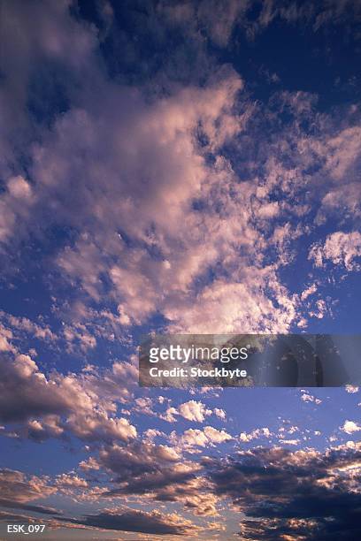 scattered altocumulus and cumulus clouds - altocumulus stock pictures, royalty-free photos & images