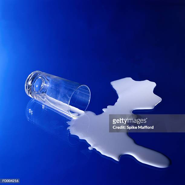 spilt milk - spilt milk foto e immagini stock