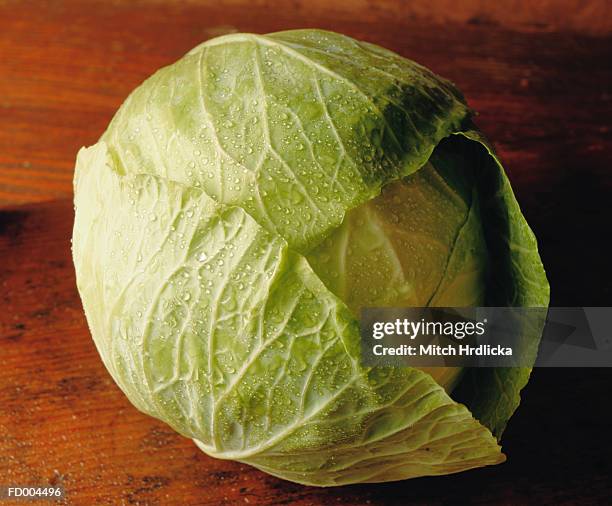 green cabbage above view - green cabbage stock pictures, royalty-free photos & images