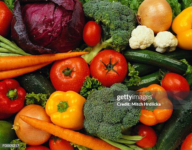 vegetable background - orangefarbige paprika stock-fotos und bilder