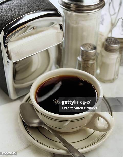 cup of coffee, napkins and condiments - napkin holder stock pictures, royalty-free photos & images