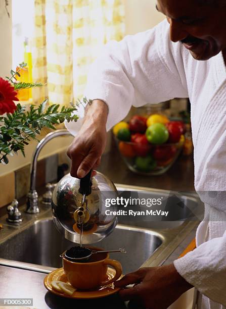 401 Older Man Making Tea Stock Photos, High-Res Pictures, and Images ...