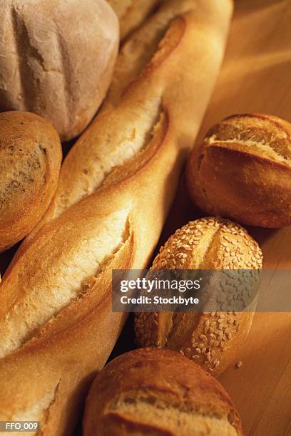 assortment of bread loaves - sesame seed bun stock pictures, royalty-free photos & images