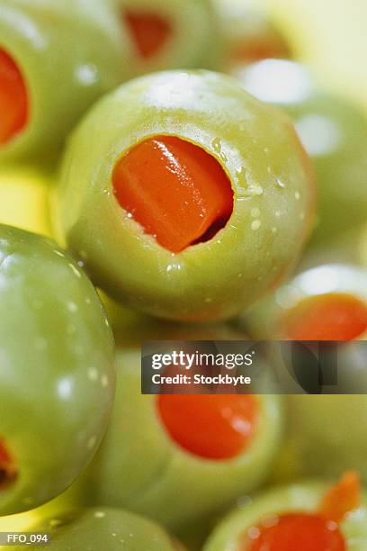 spanish olives stuffed with pimento - olive pimento stock pictures, royalty-free photos & images