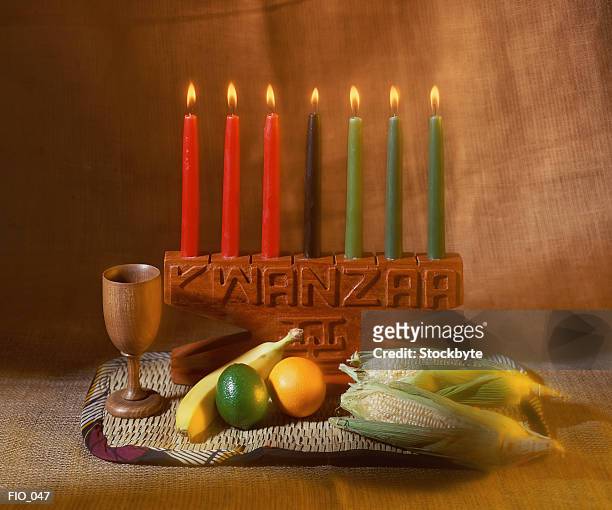 kwanzaa candles and food - kwanzaa ストックフォトと画像