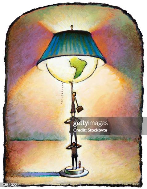 Lamp Made Of Figures Standing On Each Others Shoulders Holding