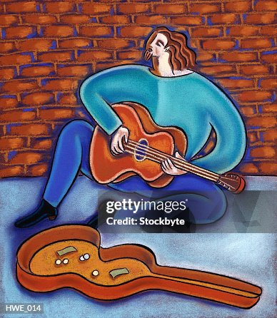 Busker playing guitar Busker playing guitar