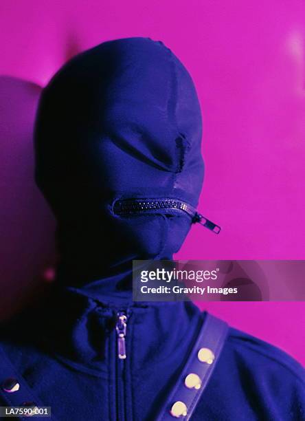 person wearing zippered fetish mask, portrait - s & m ストックフォトと画像