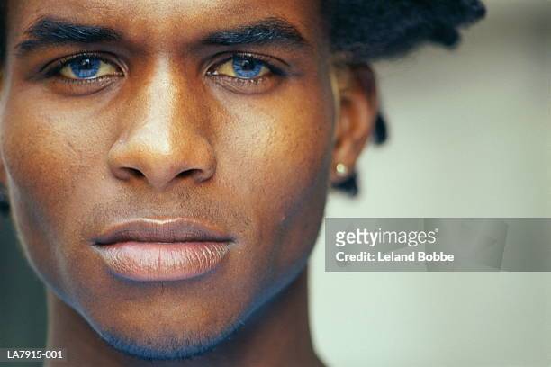 young man, close-up, portrait - male blue eyes stock pictures, royalty-free photos & images