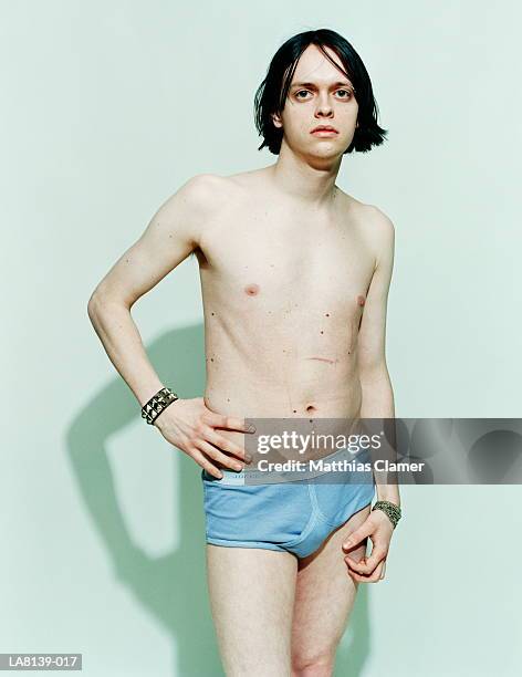 semi-naked teenage boy (17-19) with scars, in underpants, portrait - boy in briefs photos et images de collection
