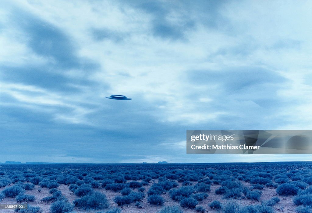 Flying disc over desert