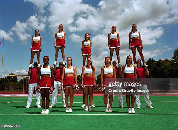cheerleading squad, portrait - men cheerleaders stock pictures, royalty-free photos & images