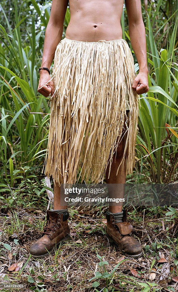 Man Wearing Grass Skirt Lowsection High-Res Stock Photo - Getty Images
