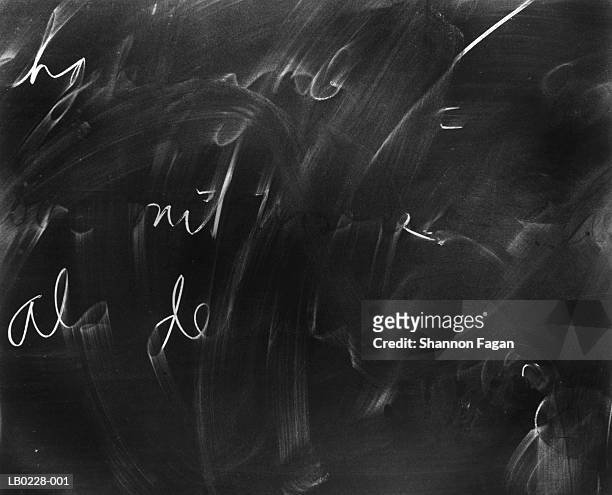 chalkboard with half erased writing - handwriting school stock pictures, royalty-free photos & images