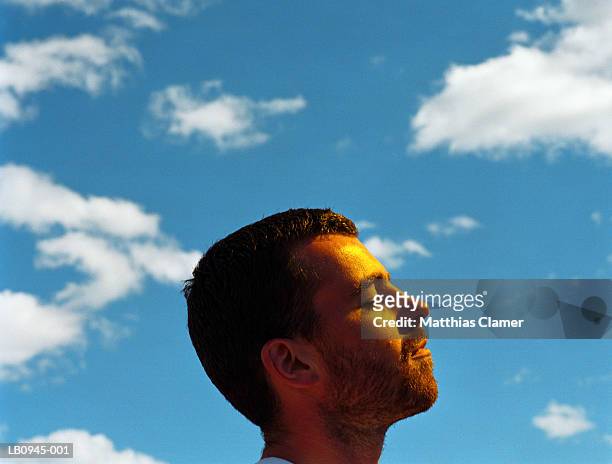 man outdoors, close up, profile (gel effect) - ゲル効果 ストックフォトと画像