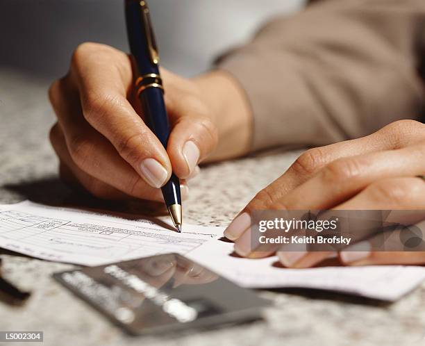Signimg 696 Signing Receipt Stock Photos, High-Res Pictures, and Images - Getty ...