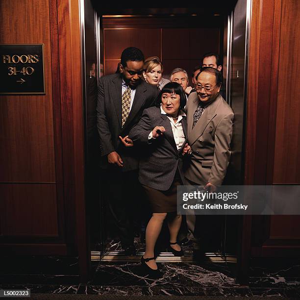 crowded elevator - crowded elevator stockfoto's en -beelden