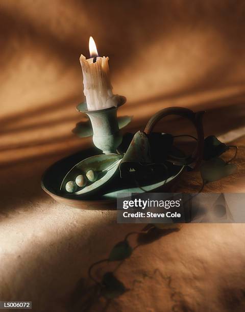 candlestick holder and candle - candlestick stock pictures, royalty-free photos & images