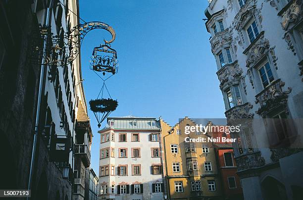 old sign in innsbruck - north tirol stock pictures, royalty-free photos & images