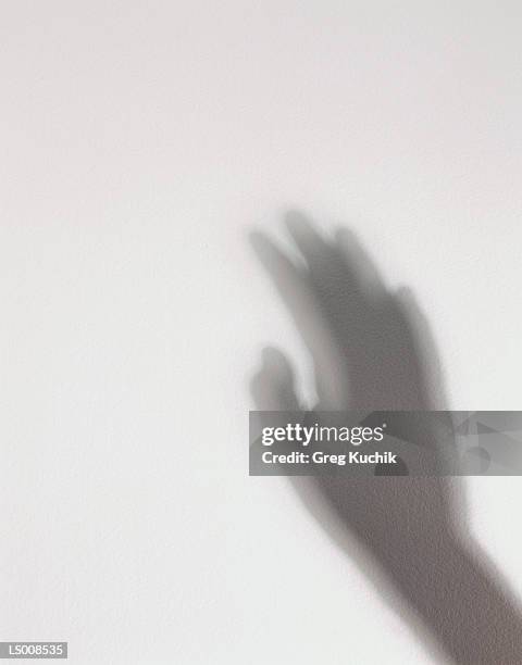 hand shadow - greg stock pictures, royalty-free photos & images