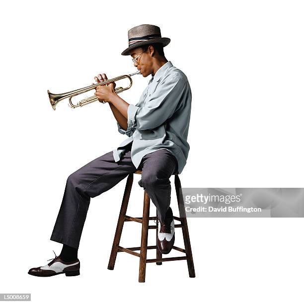 trumpet player - trumpet fotografías e imágenes de stock