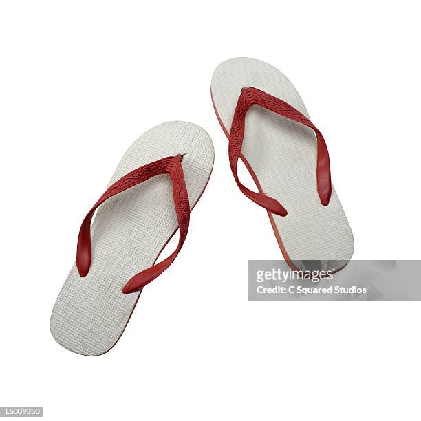 rubber flip-flop sandals - red flip flops isolated stock pictures, royalty-free photos & images