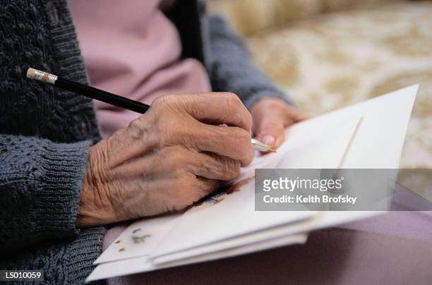 addressing a letter - handwriting letter stock pictures, royalty-free photos & images