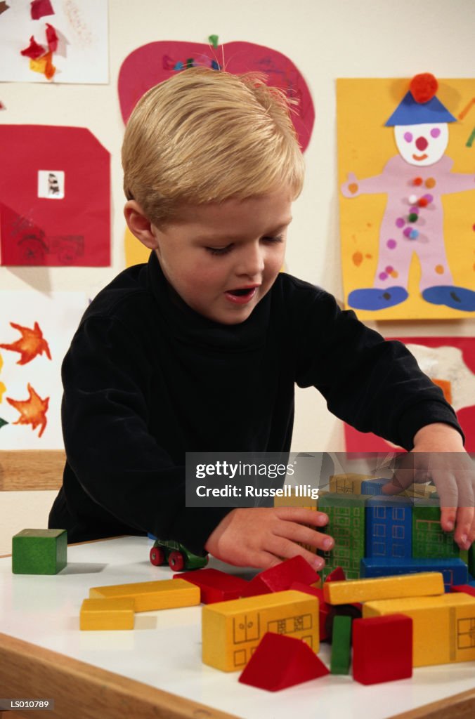 Boy Playing With Blocks