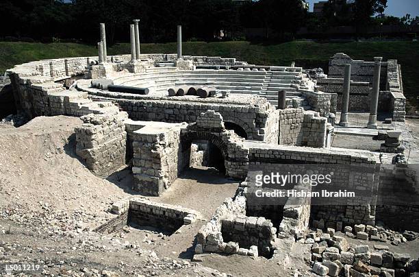 ruins of a roman amphitheater - ancient alexandria stock-fotos und bilder