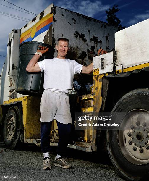 sanitation worker - schrottpresse stock-fotos und bilder