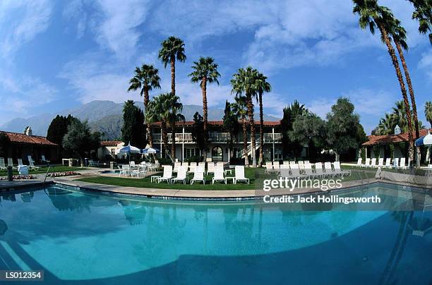 swimming pool at a resort - supreme fiction stock pictures, royalty-free photos & images