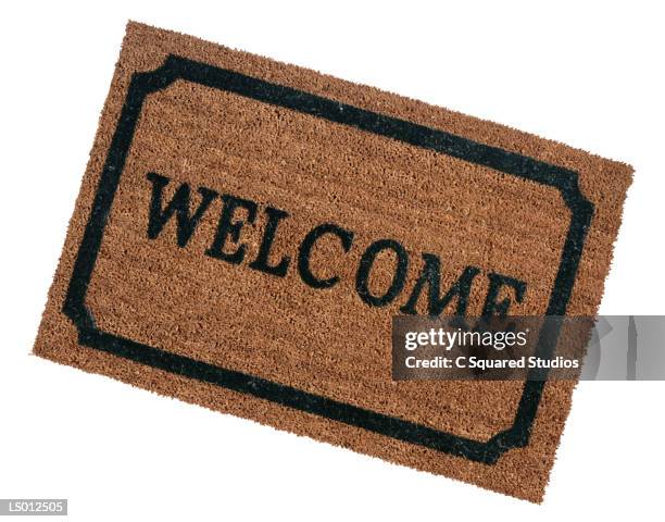 welcome doormat - welcome mat isolated stock pictures, royalty-free photos & images