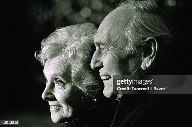 senior couple smiling, side view, close-up (b&w) - bavosi ストックフォトと画像