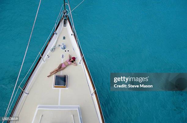 sunbathing on the deck of a yacht - yacht top view stock pictures, royalty-free photos & images