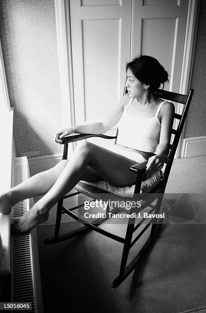 woman in rocking chair - bavosi ストックフォトと画像