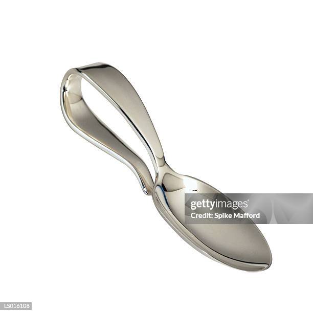 silver spoon - silver spoon in mouth stock pictures, royalty-free photos & images