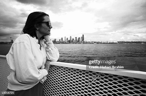 woman on ferry - north pacific ocean stock pictures, royalty-free photos & images