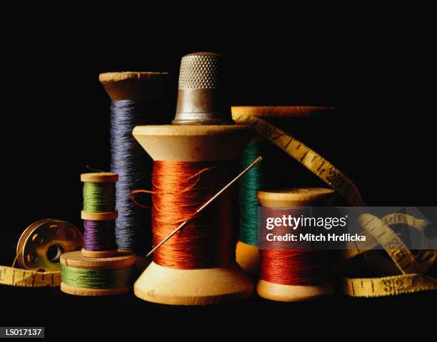 needle and thread - thimble stock pictures, royalty-free photos & images