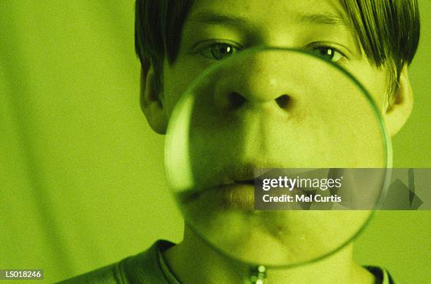 frown in magnifying glass - curtis stock pictures, royalty-free photos & images