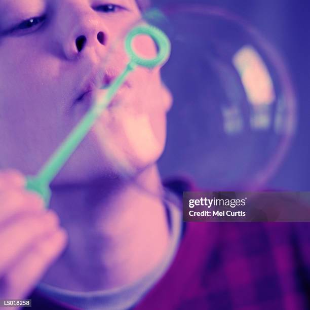 boy blowing bubble - curtis stock pictures, royalty-free photos & images