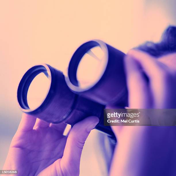 looking through binoculars - curtis stock pictures, royalty-free photos & images