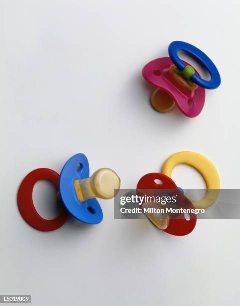 pacifiers - ancine stock pictures, royalty-free photos & images