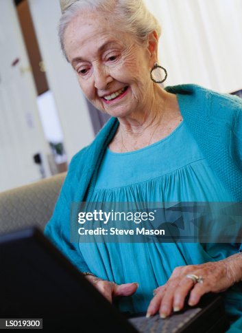 Woman Using Laptop Woman Using Laptop
